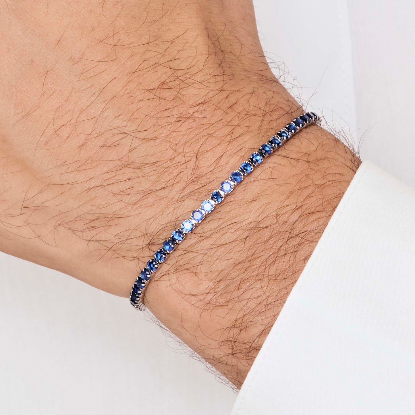 HERREN-TENNISARMBAND AUS STAHL MIT BLAUEN KRISTALLEN