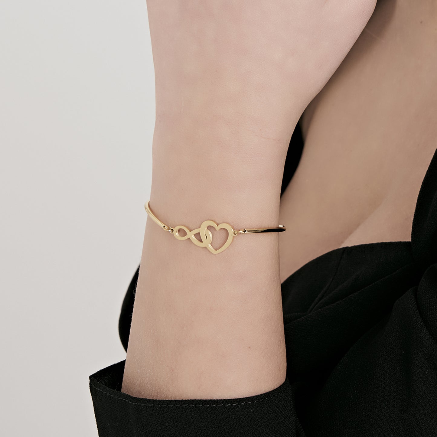 IP GOLD STAHL DAMENARMBAND MIT HERZ UND UNENDLICHKEIT