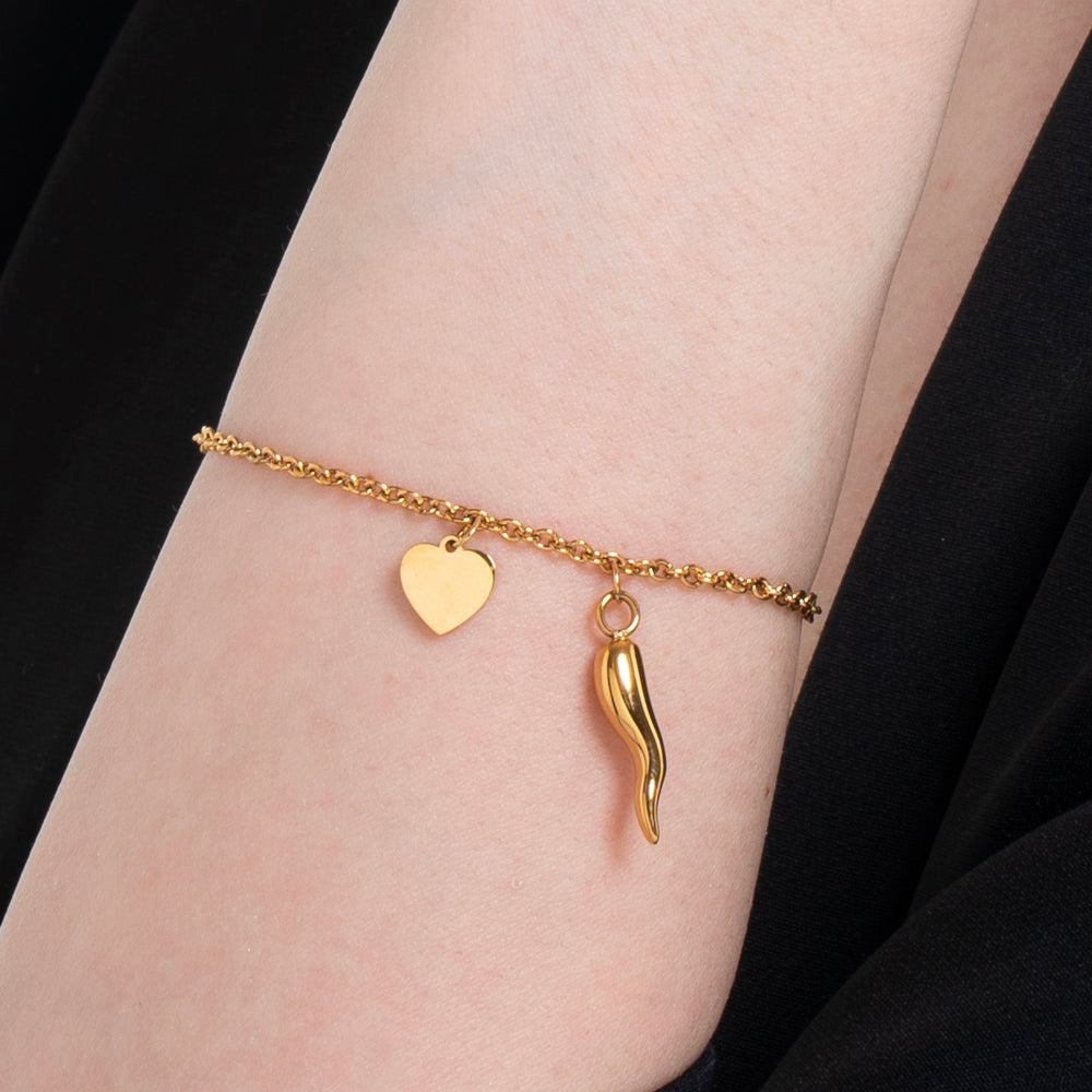 BRACCIALE DONNA IN ACCIAIO E IP GOLD CON CORNO E CUORE