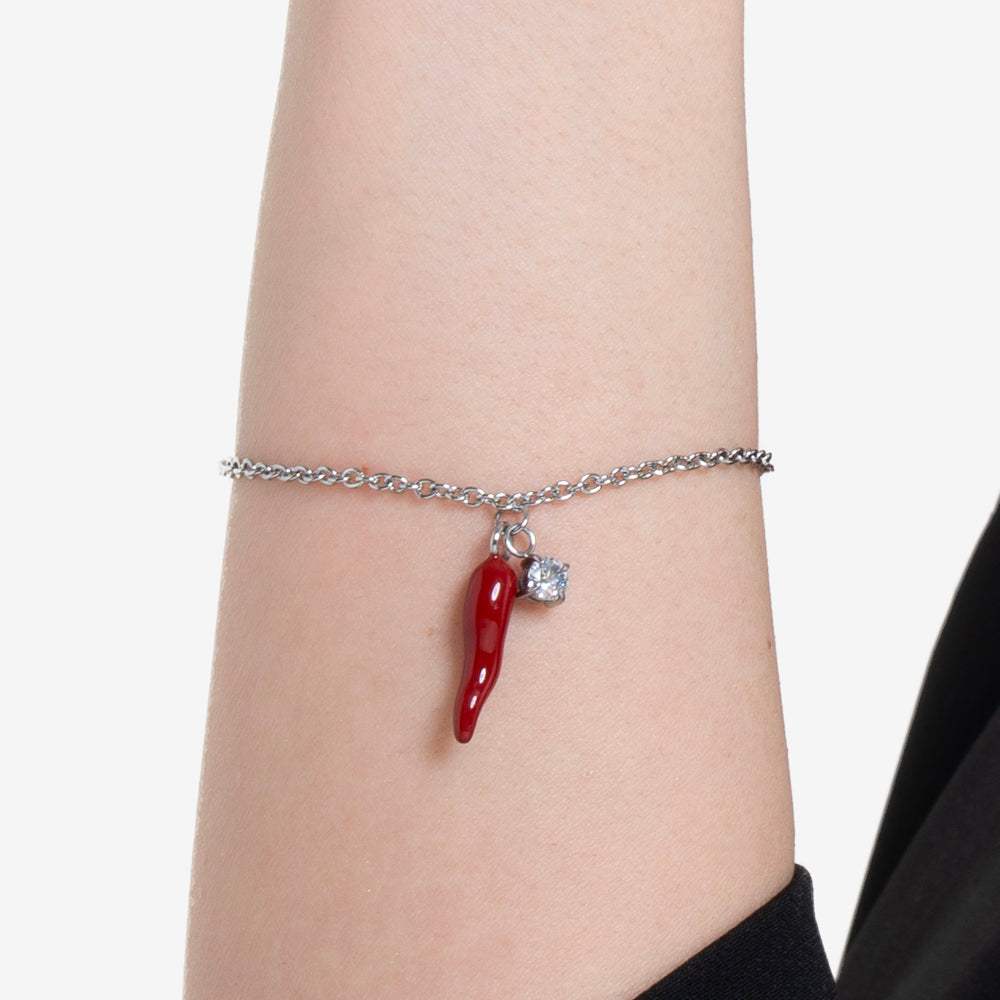 BRACCIALE IN ACCIAIO CON CORNO ROSSO E PUNTO LUCE